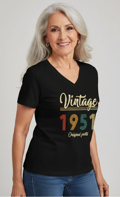 Person wearing a black t-shirt with 'Vintage 1951 Original parts' design on a white background
