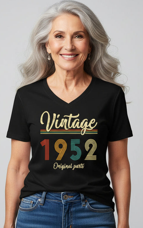 Person wearing a black t-shirt with 'Vintage 1952 Original parts' design on a white background