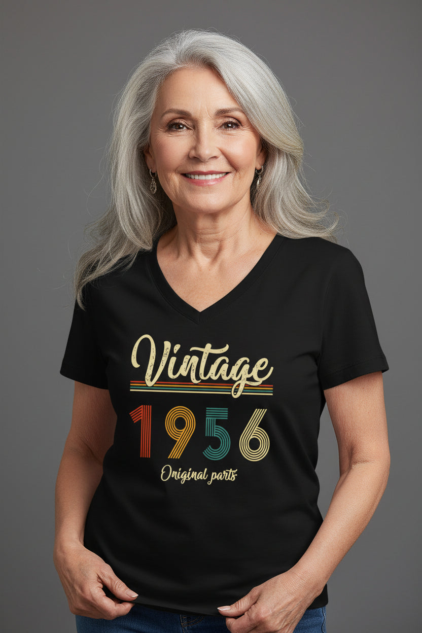 Person wearing a black t-shirt with 'Vintage 1956 Original parts' design on a white background
