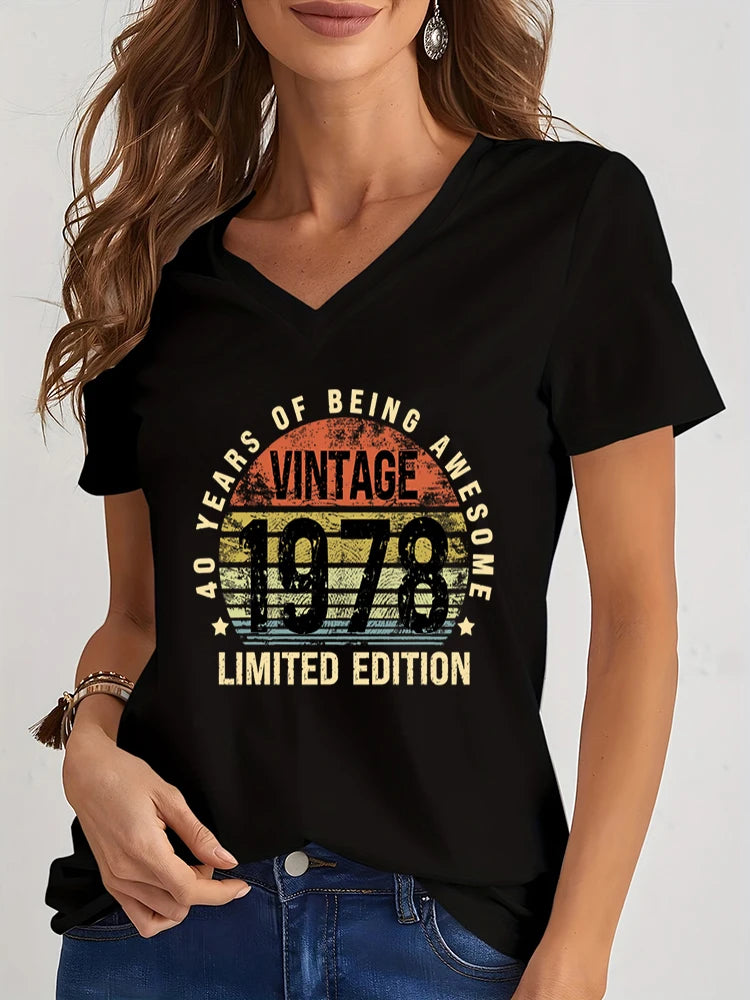 Woman wearing a black t-shirt with 'Vintage 1978' design on a white background