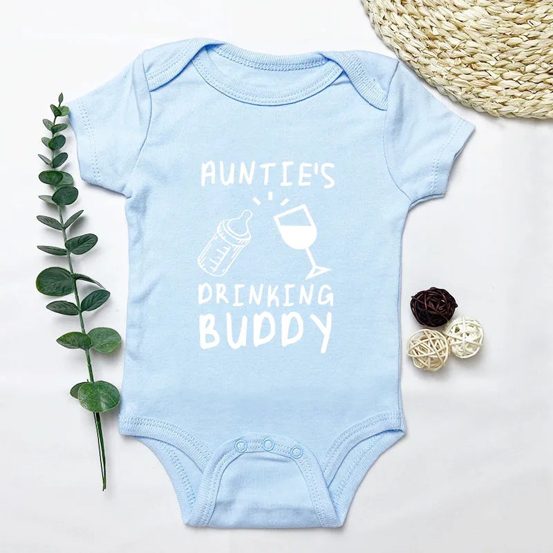 Light blue baby onesie with 'Auntie's Drinking Buddy' text on a white background
