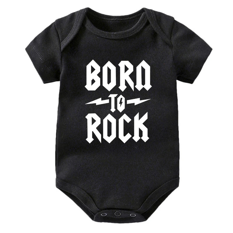 Black baby onesie with 'Born to Rock' text on a white background