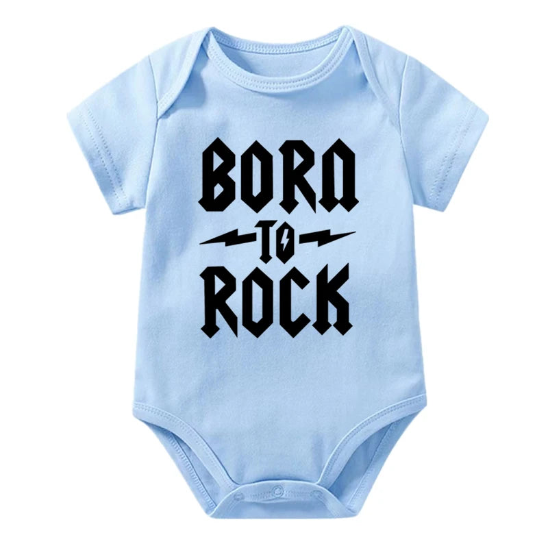 Light blue baby onesie with 'Born to Rock' text on a white background