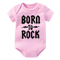 Pink baby onesie with 'Born to Rock' text on a white background