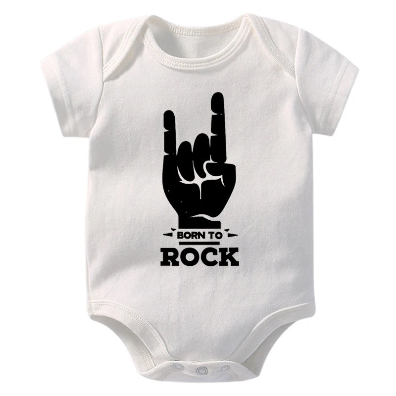 White baby onesie with black 'Born to Rock' design on a white background