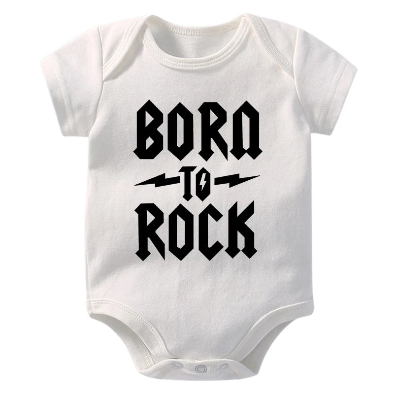 White baby onesie with 'Born to Rock' text on a white background