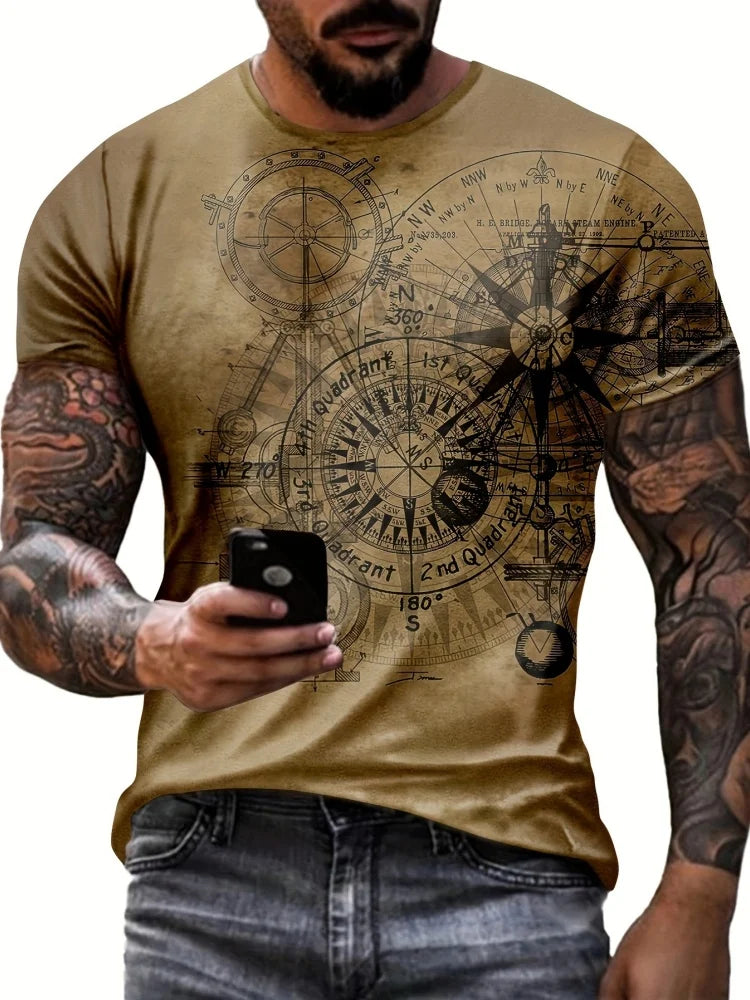 Man wearing a t-shirt with a compass design, holding a phone.