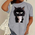 Person wearing a gray t-shirt with a black cat holding a coffee cup graphic.