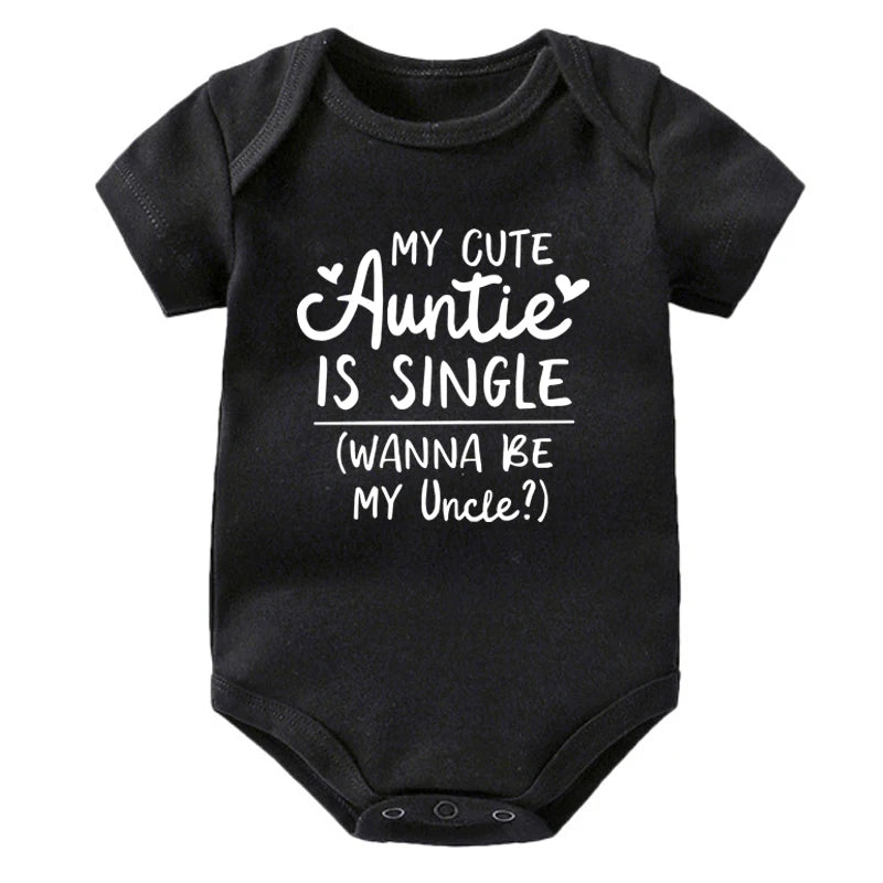 Black baby onesie with white text on a white background