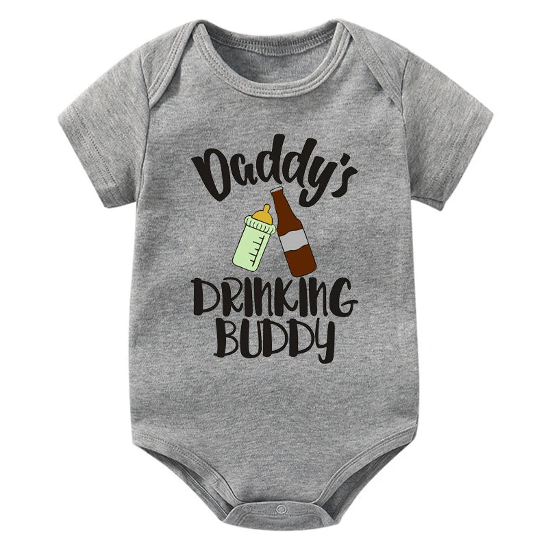 Gray baby onesie with 'Daddy's Drinking Buddy' text and bottle graphics on a white background