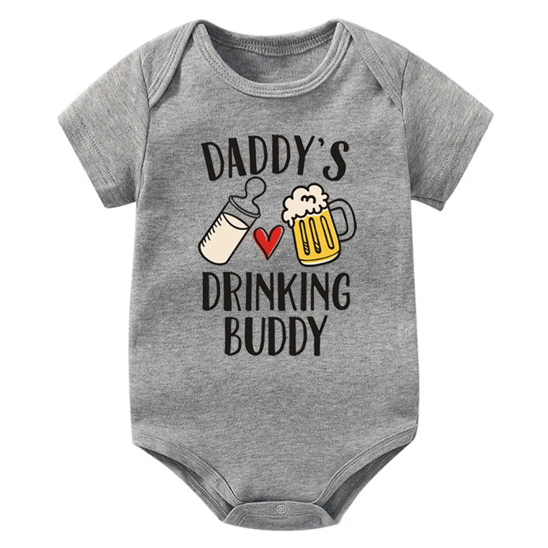 Gray baby onesie with 'Daddy's Drinking Buddy' text and graphics on a white background
