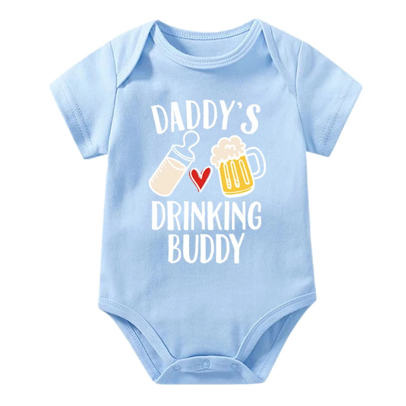 Light blue baby onesie with 'Daddy's Drinking Buddy' text and graphics on a white background