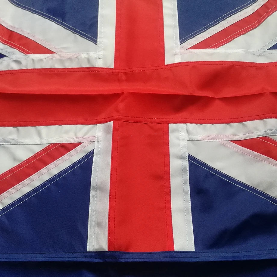 Close-up of a New Zealand flag with red, white, and blue colours.
