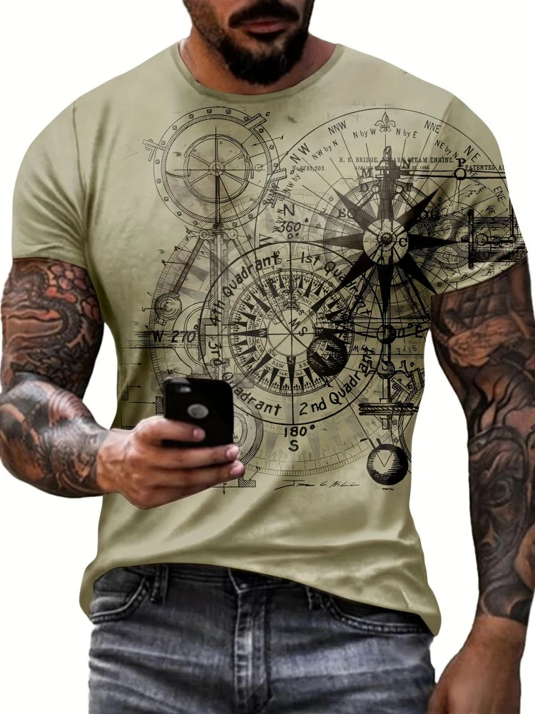 Man wearing a t-shirt with compass design holding a phone.