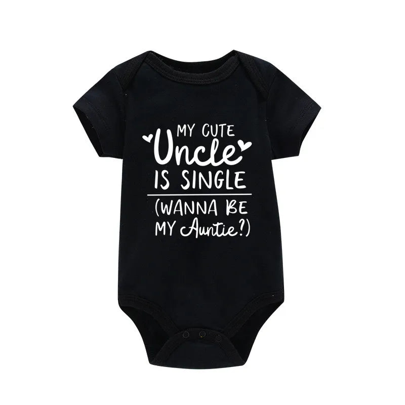 Black baby onesie with white text on a white background
