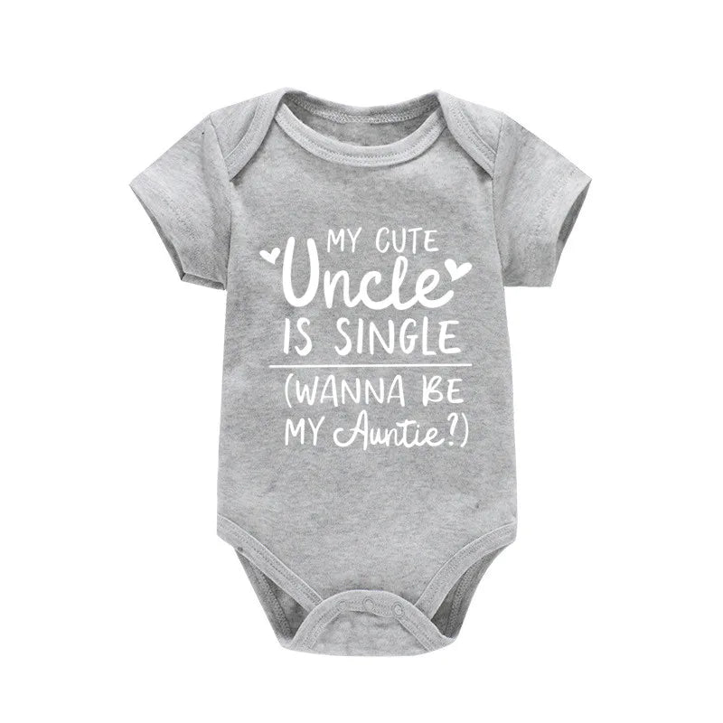 Gray baby onesie with white text on a white background