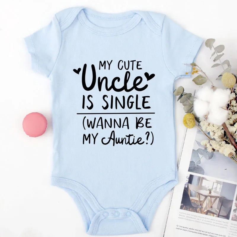 Light blue baby onesie with text on a white background