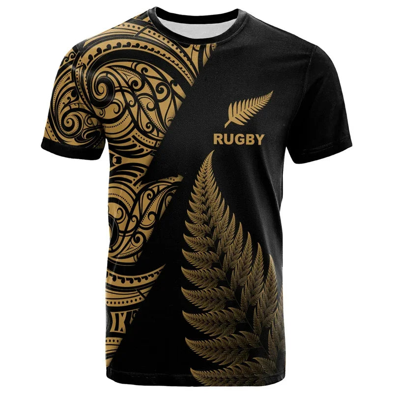 Black rugby jersey with gold patterns and text on a white background