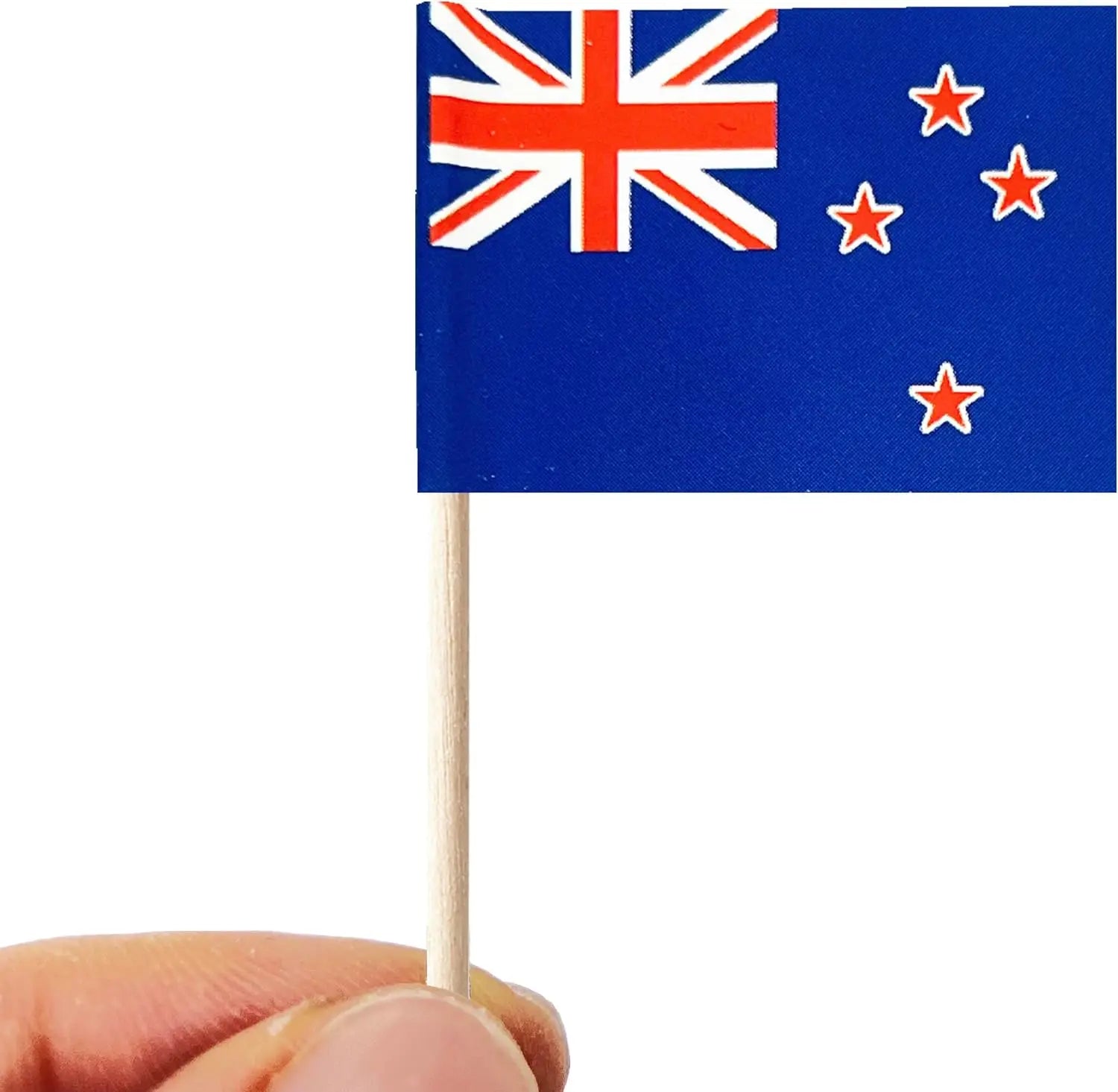 Small flag on a stick with the Union Jack and three red stars against a blue background, held by a hand.