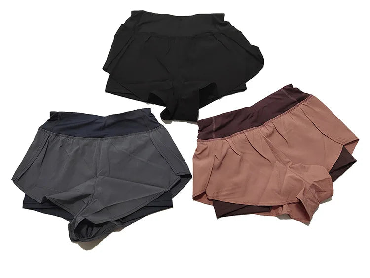 Three pairs of women's underwear in black, gray, and brown on a white background