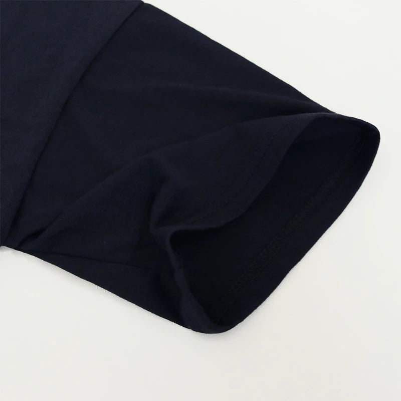 Navy blue fabric on a light gray background