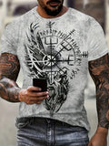Man wearing a t-shirt with a Viking design, holding a phone.