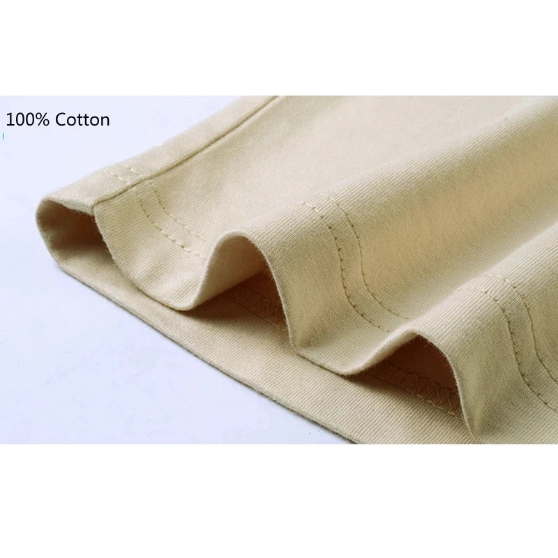 Close-up of beige fabric with '100% Cotton' text on a light purple background