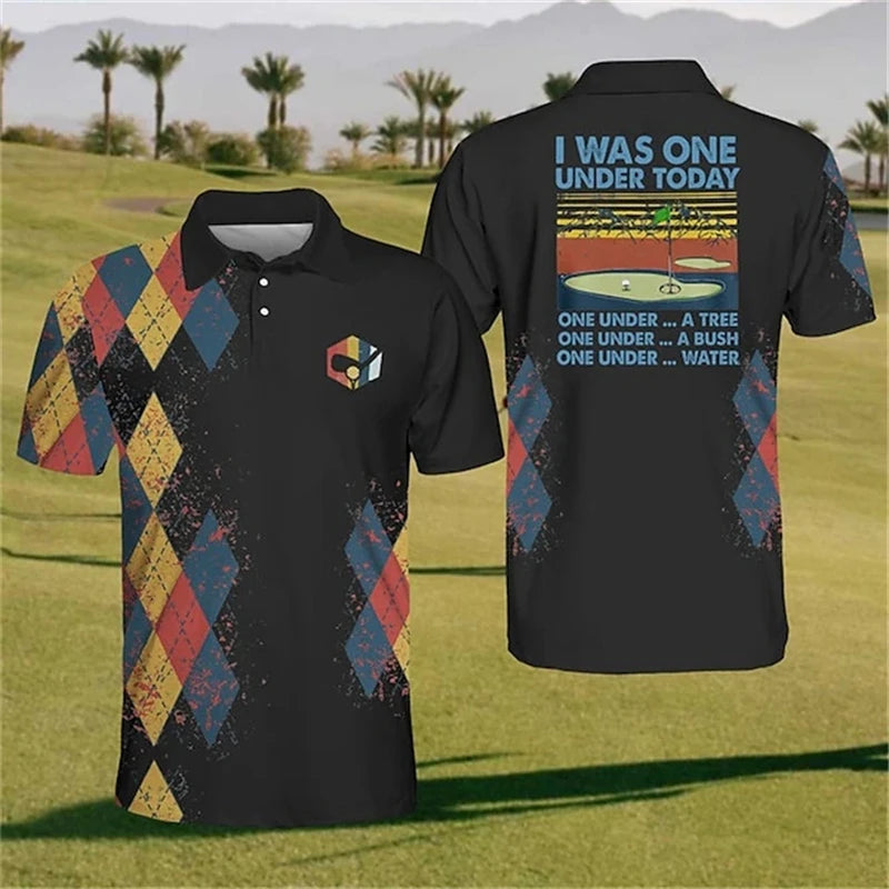 Black polo shirt with colorful argyle pattern on front and humorous golf-themed text on back, displayed on a golf course.