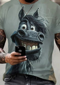 Person wearing a t-shirt with a cartoonish donkey design, holding a phone.