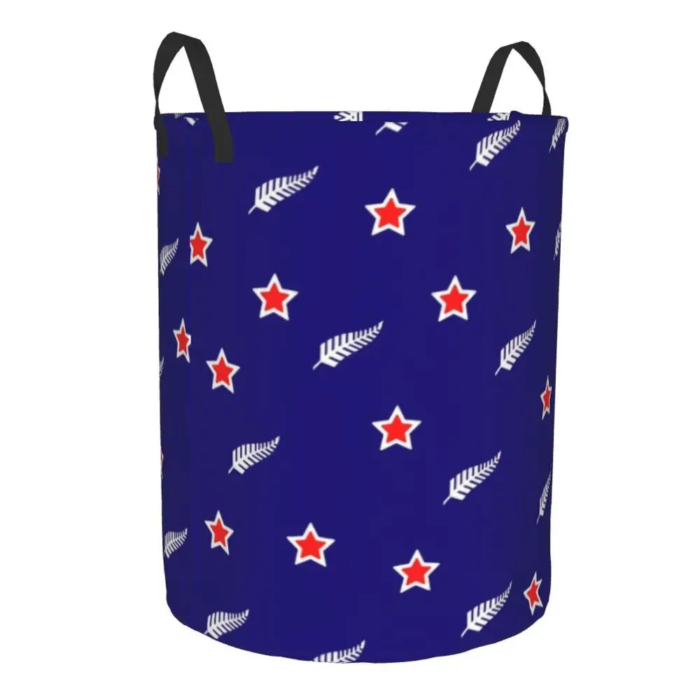 Blue laundry basket with red star and white leaf pattern on a white background