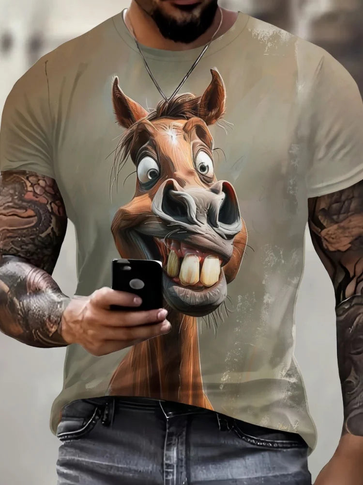 Person wearing a t-shirt with a horse graphic design, holding a phone.