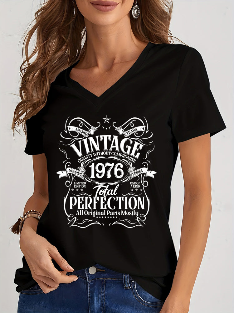 Woman wearing a black t-shirt with vintage design 1976 text